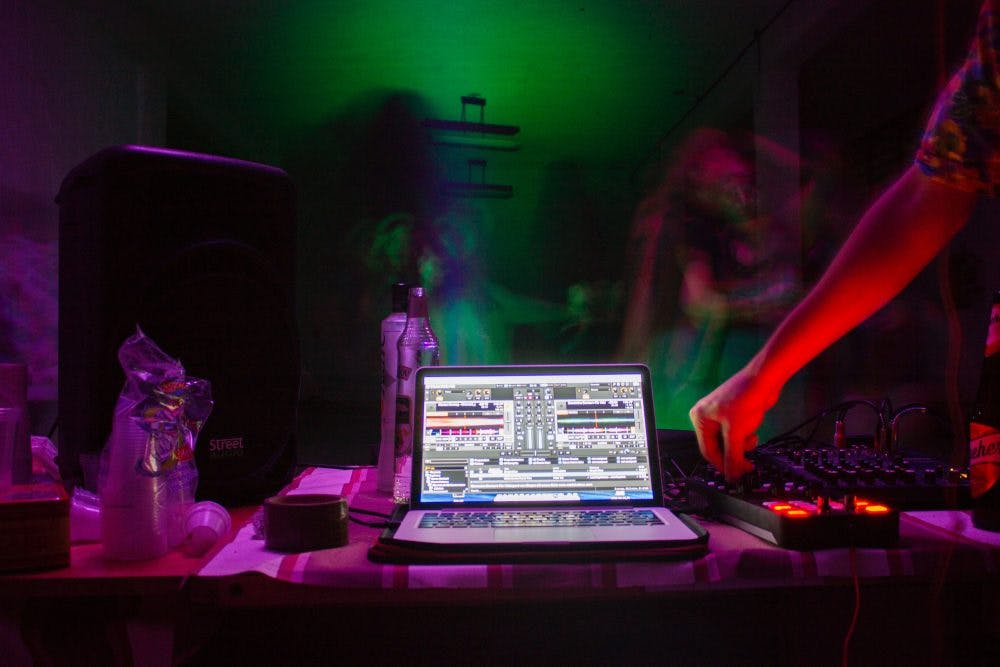Long Exposure Photo Of Person Using Laptop And Audio Mixer 2713711 1