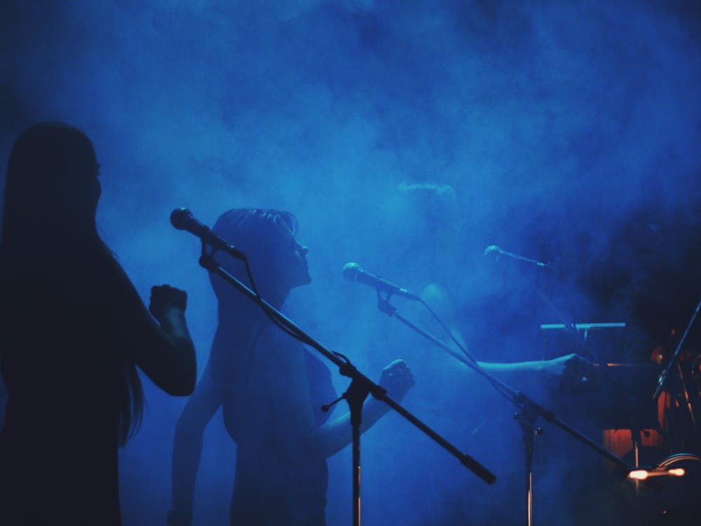 Ai Choir Harmony Singers On Stage Blue Light 2025